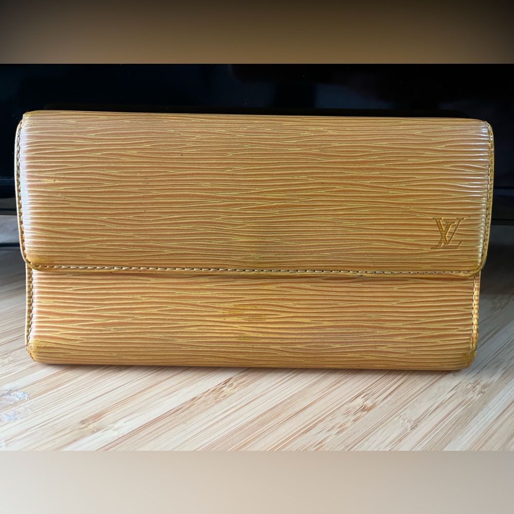 Authentic Louis Vuitton epi yellow, and purple, leather wallet.